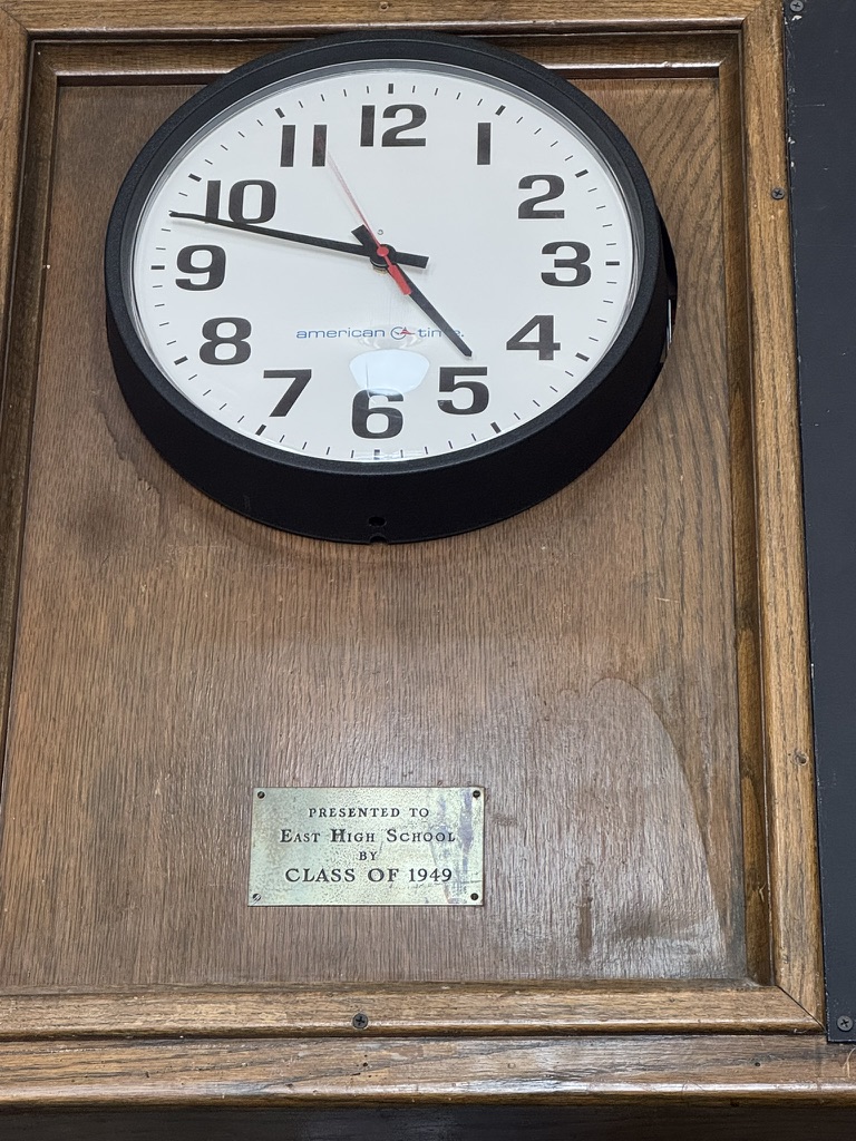 A wall clock in an oak case presented to East High School by the Class of 1949