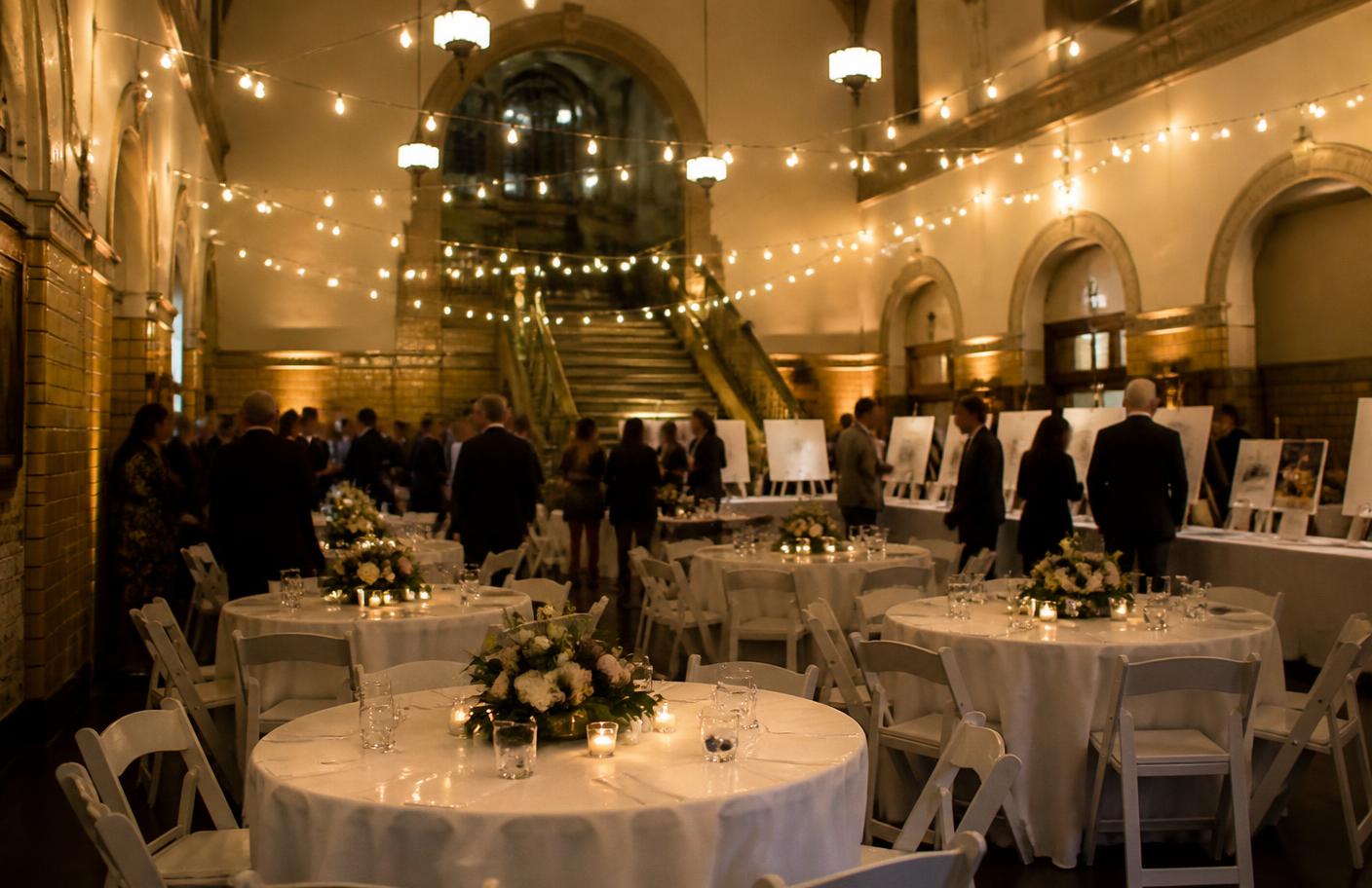 A fundraising gala set up in a historic school hall
